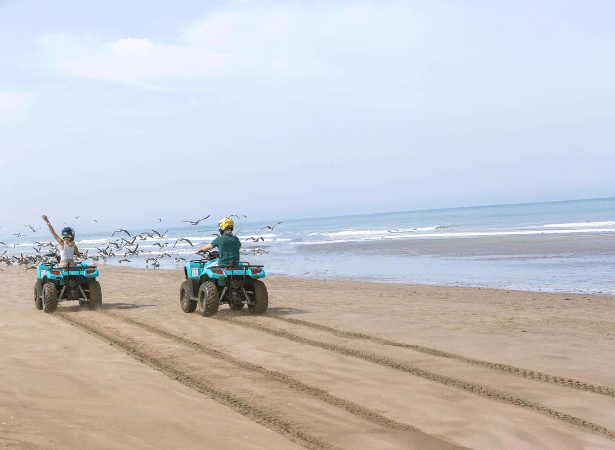 Mazagan Beach & Golf Resort El Jadida Dış mekan fotoğraf ATV riding on the beach